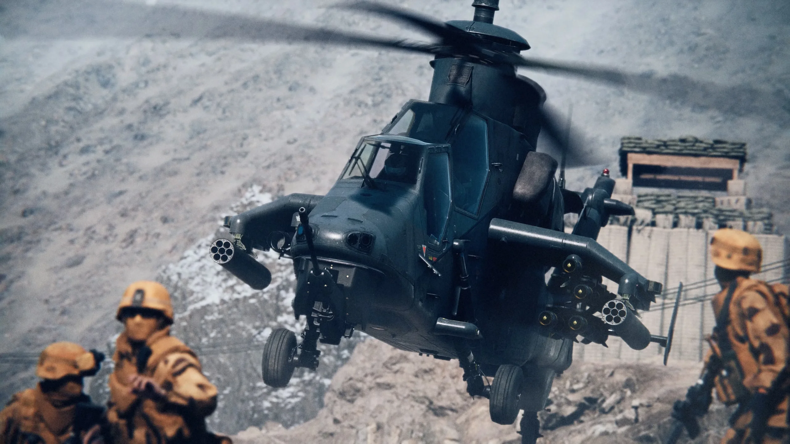 A helicopter looms over soldiers on a mountaintop in key art for Battlefield 6