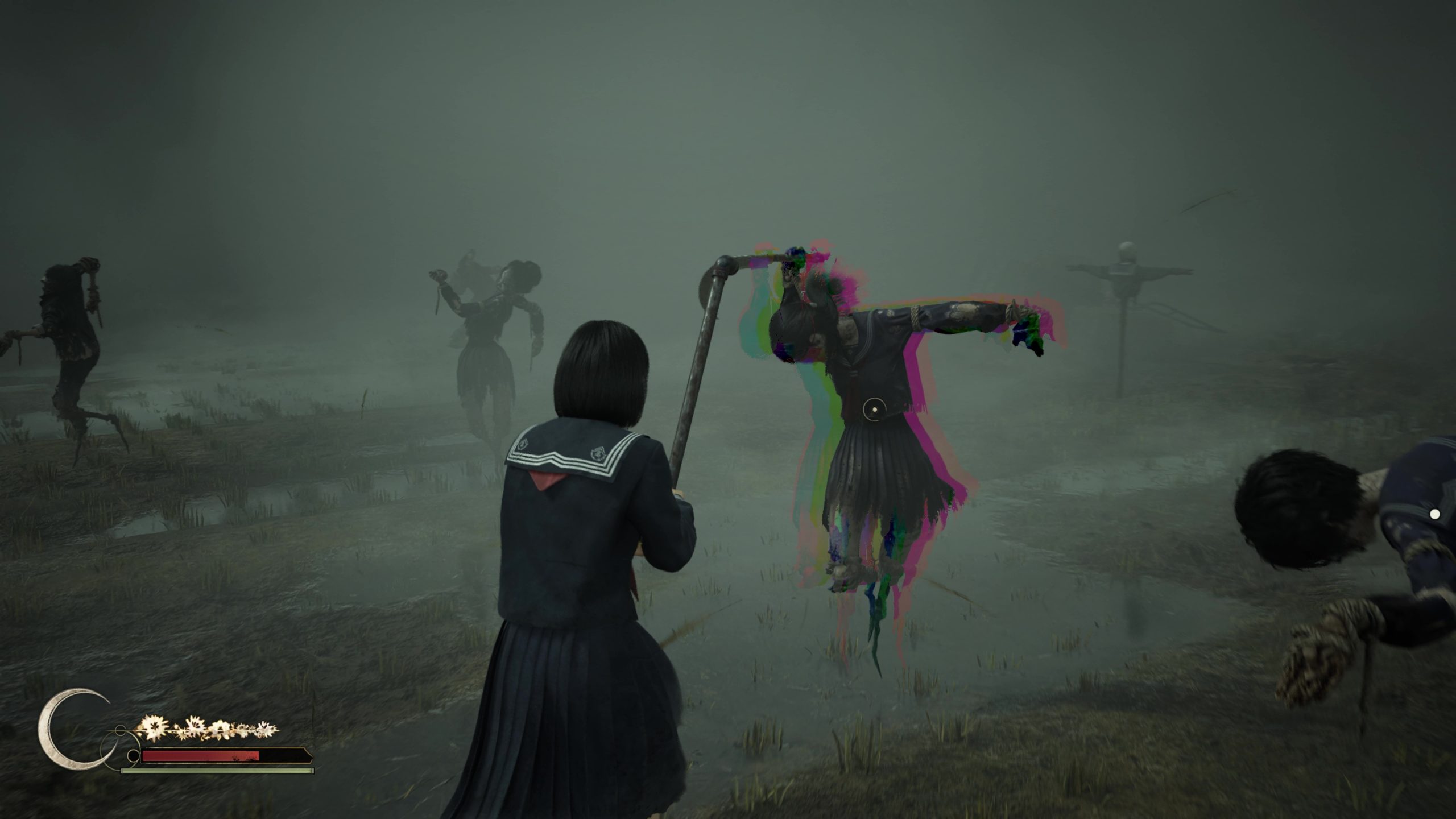 A scarecrow enemy displays a chromatic aura in Silent Hill f indicating a heavy attack will counter them