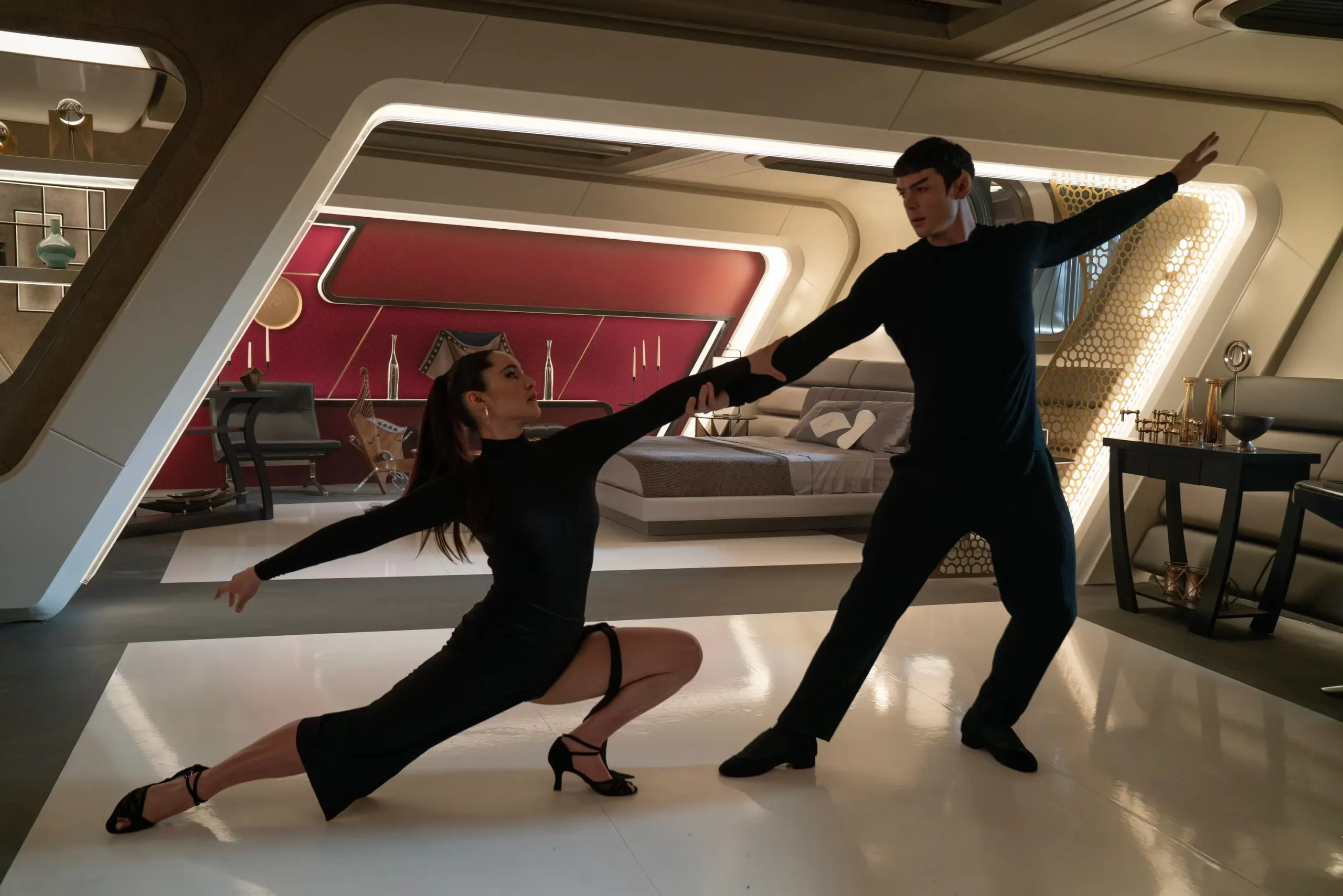 Christina Chong as Laían and Ethan Peck as Spock dance together in Star Trek: Strange New Worlds
